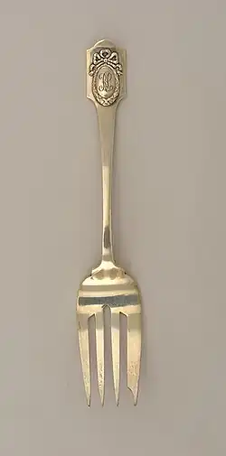 Neo-Louis XVI style fork with medallion and monogram, by Shreve & Co., c. 1909, silver, Cooper Hewitt, Smithsonian Design Museum, New York City