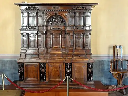 Wardrobe; c.1530; carved walnut; height: 230 cm; Château d'Écouen[49]