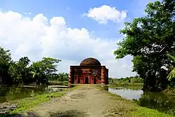 Mosque surrounded by paddy field