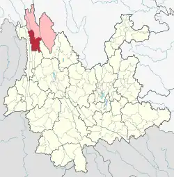 Location of Weixi County (red) in Diqing Prefecture (pink) within Yunnan