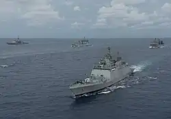 INS Satpura (F48) steams with U.S. and Indian ships in formation during Malabar 2012.
