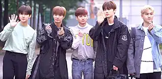 NU'EST in May 2019 From left to right: Ren, JR, Aron, Minhyun, and Baekho