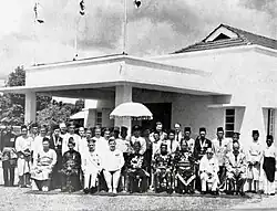 A group photo of the first Legislative Council with the Old Lapau in the background, 1959