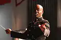 CWO3 Edward Hayes, director of the 1st Marine Division Band, conducting during a concert at the California Maritime Academy in Vallejo.
