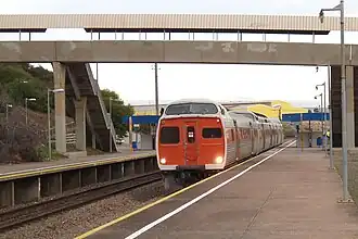 an orange 2000 class railcar