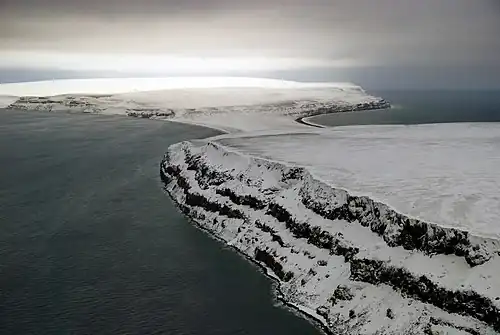 The eastern end of Bennett Island with its glaciated tombolo in the background