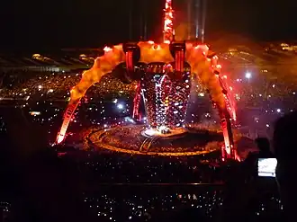 Large, red stadium stage at night