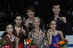 The pairs event medalists at the 2011 Skate Canada International