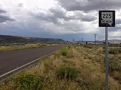 First reassurance sign along southbound SR 225 in Owyhee
