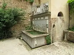 Fountain at the east end of the garden, with aquatic imagery