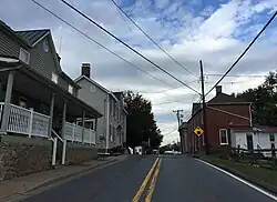 View west along Maryland State Route 107 (Fisher Avenue) at Norris Road