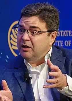 Photograph of Ricardo Zúñiga speaking at an event in 2024