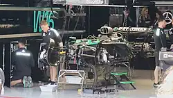 W16 being assembled in the pit building prior to the 2025 Japanese Grand Prix