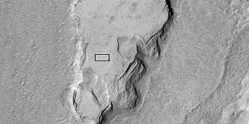 Enlarged view of a part of previous image, as seen by HiRISE under HiWish program. The rectangle represents the size of a football field.