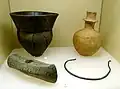 Pottery, stone axe, copper necklace