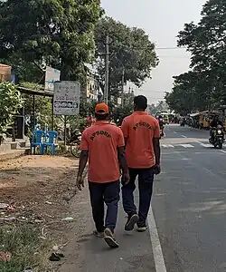 TWO APSDRF personnel walking at the collision site