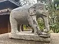 Stone elephant at the entrance of the pagoda
