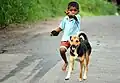 A dog and a boy in Sri Lanka