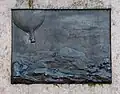 Plaque celebrating his enthusiasm for ballooning. (Bronze)