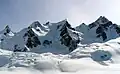 North aspect of Adamant Mountain centered above the Granite Glacier. The Stickle to left, and Austerity Mountain to right.