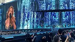 Adele and her backing band performing on the main stage