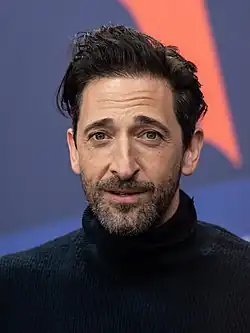 A head-and-shoulder shot of Adrien Brody at Berlinale 2023