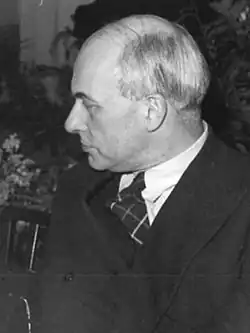 black-and-white profile photo of Bush's head, looking left