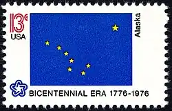 The Alaska state flag as depicted in the 1976 bicentennial postage stamp series.