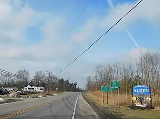 Signage entering the town of Alden on U.S. Route&nbsp;20 westbound.