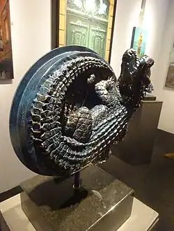 "NYC Legend" sculpture with an alligator