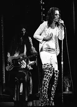 Dennis Dunaway (left) backing front man Alice Cooper