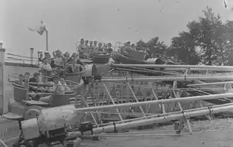 Children on amusement park ride at Belmont Park, 1941