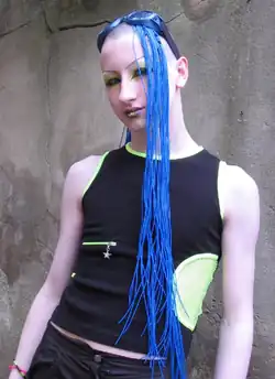Image 31A cybergoth with goggles, synthetic blue hair and shaved head, 2005 (from 2000s in fashion)