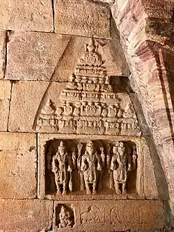 Vishnu, Shiva and Brahma in a small rock carving monument