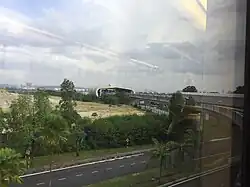 View of the station from an approaching train on the Kelana Jaya Line (different angle from the one at the start of this article)