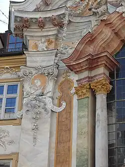 Creative rococo reinterpretations of the Corinthian capital on the facade of the Asam Church, Munich, Germany, by Egid Quirin Asam and Cosmas Damian Asam, 1733-1746