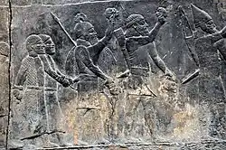 Relief depicting Assyrian soldiers and their prisoners