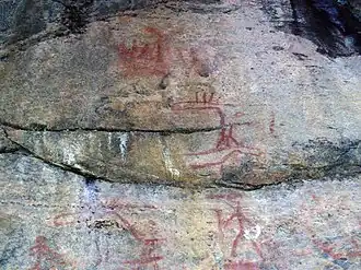 Astuvansalmi rock paintings (moose, human figures and a boat)