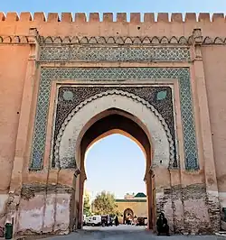 Decoration around the outer archway of the gate