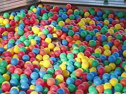 Ball pit of the type provided for children's entertainment in shopping malls