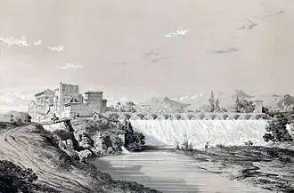 black and white image of an Iranian village containing a waterfall, and mountains