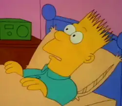 A cartoon image of a yellow boy with spiky hair in bed