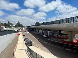 A long concrete viaduct with corrugated sheeting