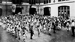 School children saluting the American flag, September 1915