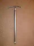 A 2011 Black Diamond ice axe. 71 cm (28 in) long with a weight of 430 g (15 oz).