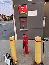 2 bollards protecting a fire hydrant in Chomedey, Quebec, Canada