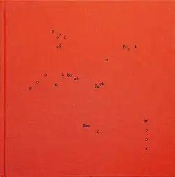 A red background, with black letters that spell "book"