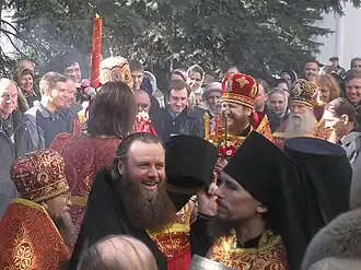 A stop for reading the Gospel and blessing with holy water during the pascal procession on Bright Tuesday (Easter Tuesday) at the Trinity Lavra of St. Sergius in Sergiev Posad, Russia