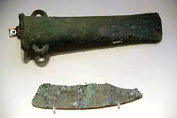Bronze axe and copper knife, Qijia Culture, Gansu. Probably derived from the Seima-Turbino culture.[11]