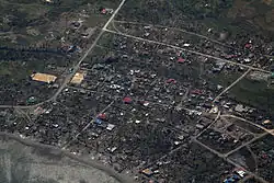 Aerial view of Maconacon after Typhoon Megi in October 2010